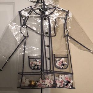Victoria Beckham rain coat with floating flowers
